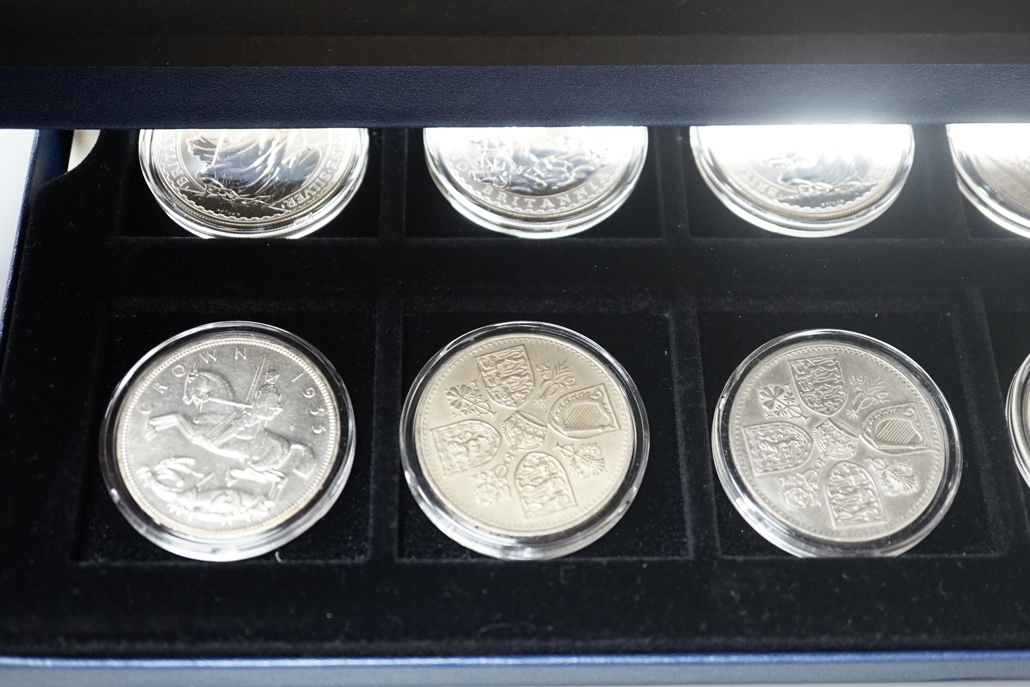 A group of coins including 1898 British Trade One Dollar, Royal Mint UK two QEII five shillings, 1935 crown, 1890 crown, silver proof coins - five 1oz. silver Britannia £2 coins 1998-2000, 2003, 2004, 2002 Queen Mother £